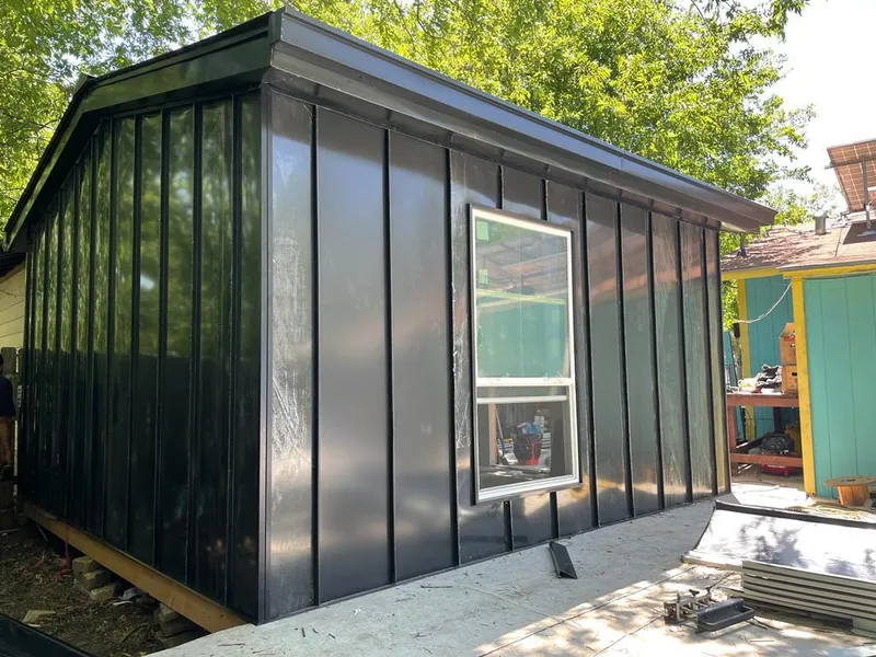 Black standing seam metal wall panels for Roof Inspection in Carolina Beach